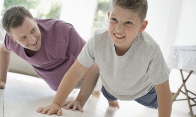Father and son do push-ups together