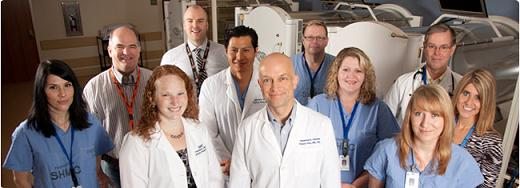 The PeaceHealth Hyperbaric Oxygen Therapy at RiverBend team poses for a group photo.