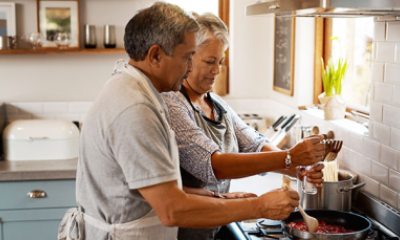 older couple cooking together