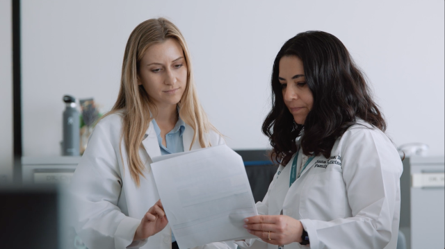 Providers in the PeaceHealth SouthWest Residency Program discuss a document